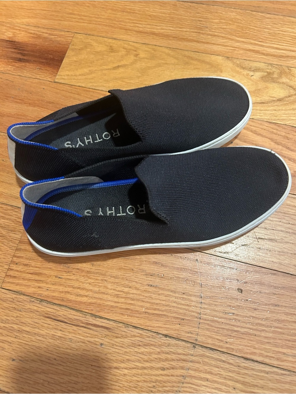 Rothy's Black Slip-On Loafers with Blue Trim